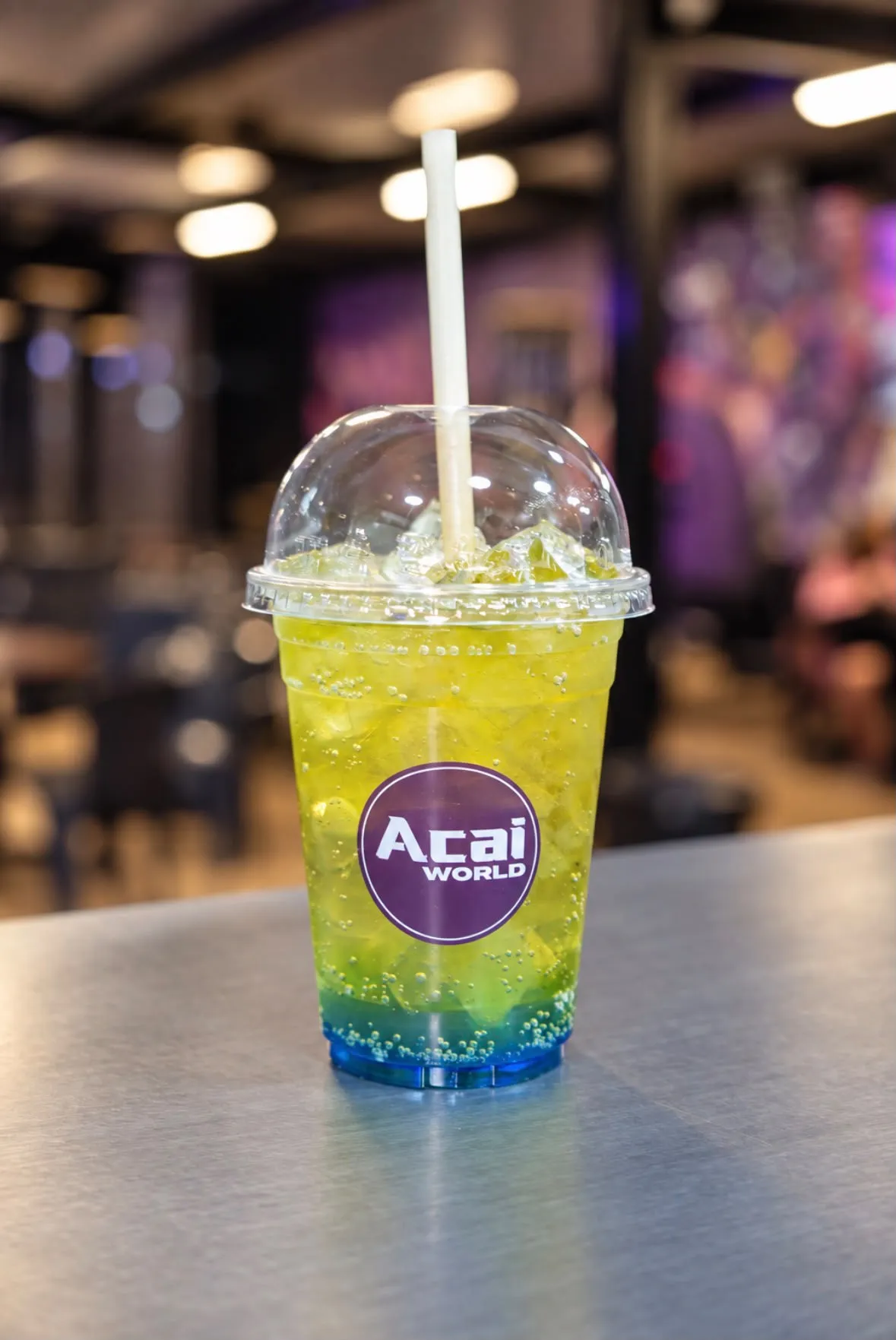 Green and blue energy smash in an Açaí World cup